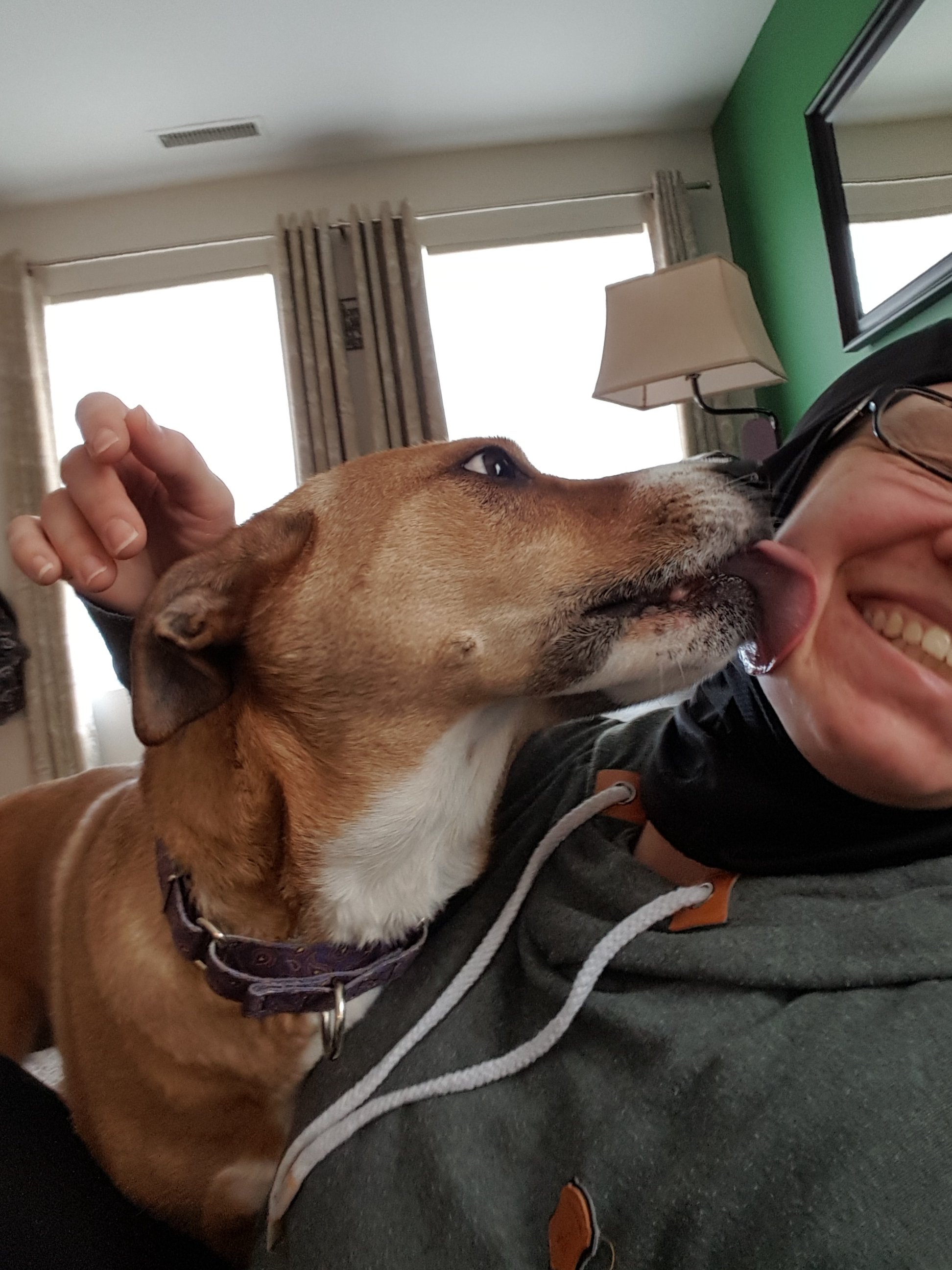 Piper is licking my face. She loves me.